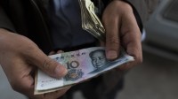 resserrement credit Chine bourse Shanghai chute 5 pour cent