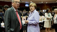 Migrants : Angela Merkel et Jean-Claude Juncker augmentent la pression