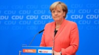 regrets Angela Merkel migrants portes ouvertes