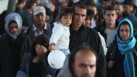 migrants Allemagne statut réfugié assigné Etat