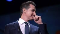 Newsom singer style Trump