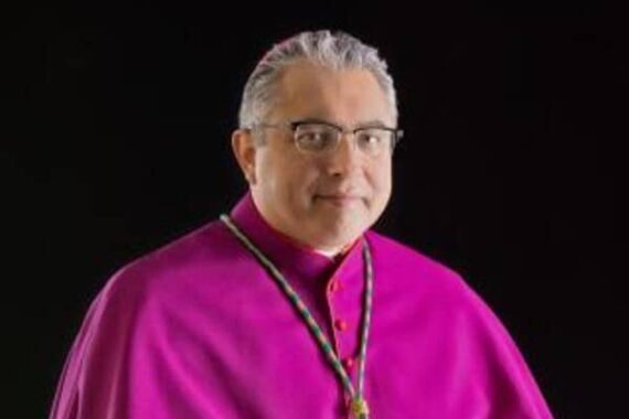 évêque Austin prie-Dieu communion